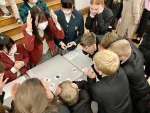 Group Discussion and Lesson Playing Cards At The Desk